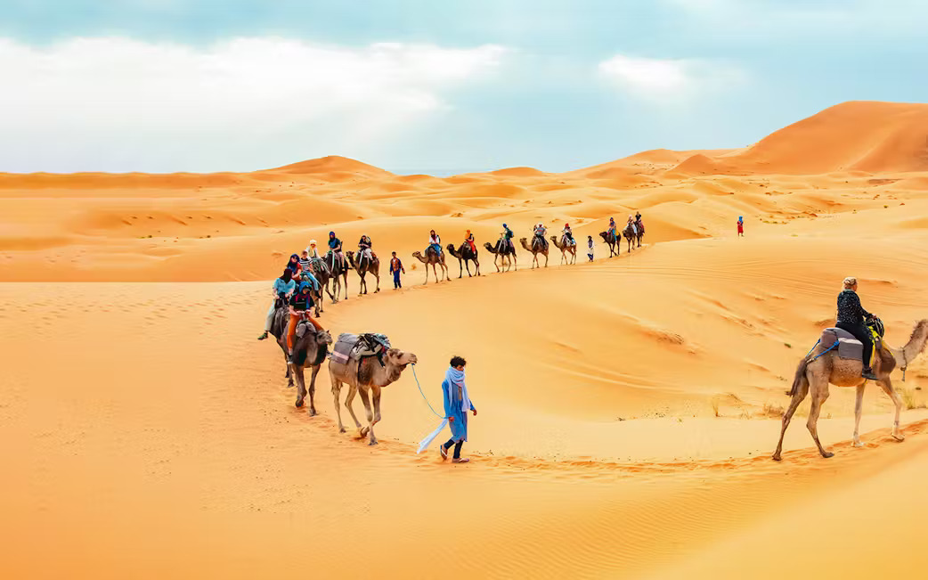 Morning Desert Safari, Camel Ride & Sandboarding